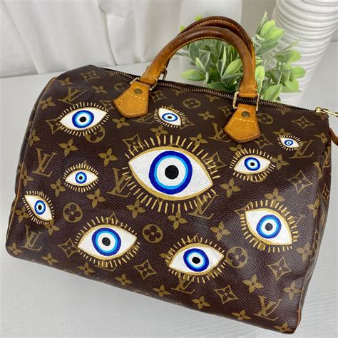 louis vuitton evil eye purse